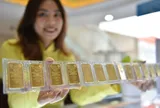 Giá vàng miếng SJC chênh giá vàng thế giới hơn 21 triệu đồng/lượng